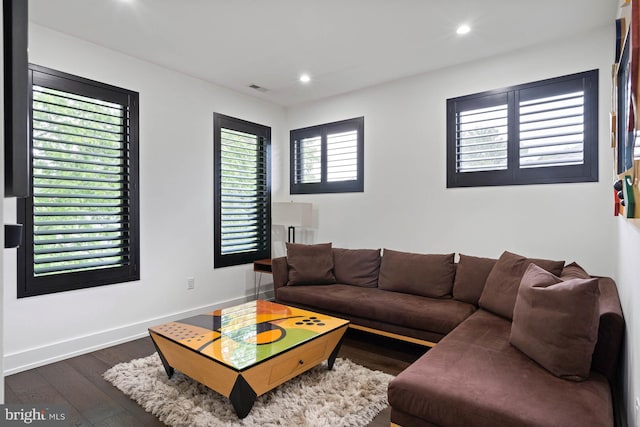 341 Hickman St, Rehoboth Beach, DE 19971 - living room with dark wood-style flooring, recessed lighting, and baseboards