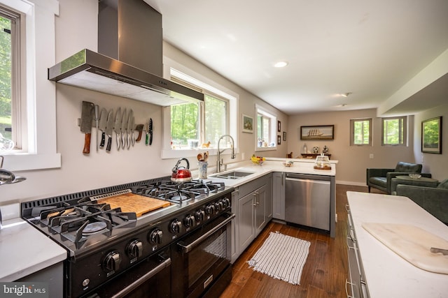 2250 Hoyes Run Rd, Mc Henry, MD 21541 - kitchen featuring wall chimney exhaust hood, stainless steel dishwasher, range with two ovens, a sink, and dark wood-style flooring