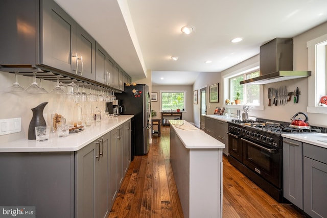 2250 Hoyes Run Rd, Mc Henry, MD 21541 - kitchen with double oven range, wall chimney range hood, gray cabinets, dark wood-style flooring, and recessed lighting