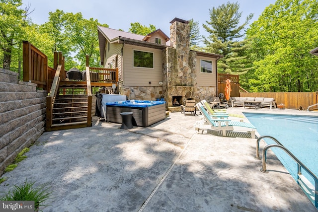 2250 Hoyes Run Rd, Mc Henry, MD 21541 - back of property with an outdoor living space with a fireplace, a patio, stone siding, stairs, and a deck