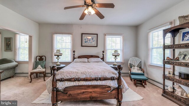 1607 Somers Point Rd, Egg Harbor Twp, NJ 08234 - bedroom with light carpet, a baseboard heating unit, and ceiling fan