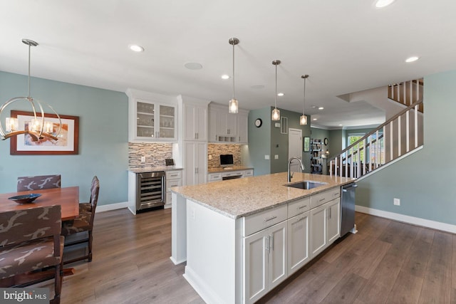 145 Center St S Unit 4, Vienna, VA 22180 - kitchen with a sink, beverage cooler, backsplash, baseboards, and recessed lighting