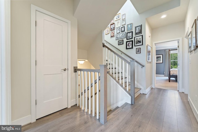 145 Center St S Unit 4, Vienna, VA 22180 - stairway with wood finished floors, baseboards, and recessed lighting