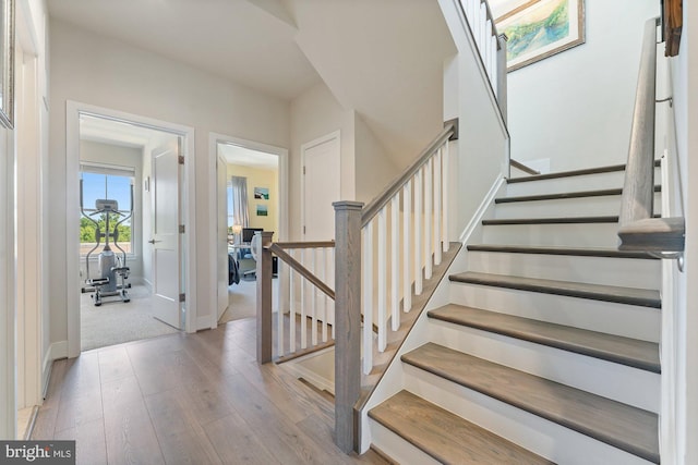 145 Center St S Unit 4, Vienna, VA 22180 - stairs with baseboards and wood finished floors