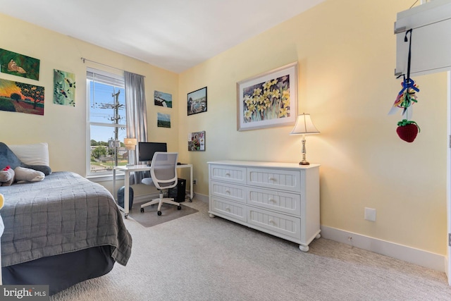 145 Center St S Unit 4, Vienna, VA 22180 - bedroom featuring light colored carpet, a desk, and baseboards