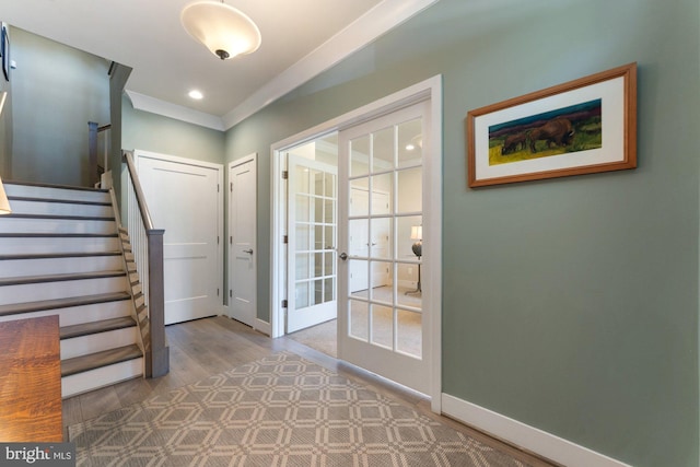 145 Center St S Unit 4, Vienna, VA 22180 - foyer entrance featuring french doors, stairs, baseboards, wood finished floors, and recessed lighting