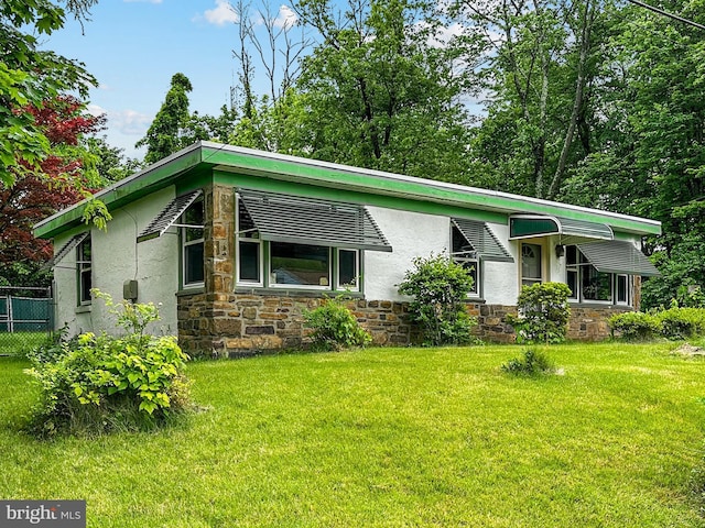 58 Washington Blvd, Norristown, PA 19403 - mid-century inspired home featuring stone siding and stucco siding