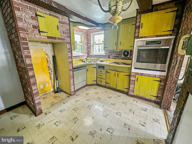 58 Washington Blvd, Norristown, PA 19403 - kitchen with oven, dishwasher, white electric cooktop, light countertops, and a sink