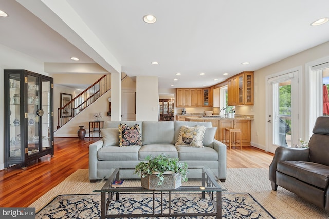 1028 Sandpiper Ln, Annapolis, MD 21403 - living area with light wood-type flooring, recessed lighting, and stairway