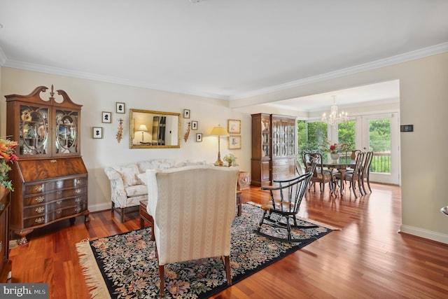 1028 Sandpiper Ln, Annapolis, MD 21403 - living area featuring ornamental molding, a chandelier, and wood finished floors