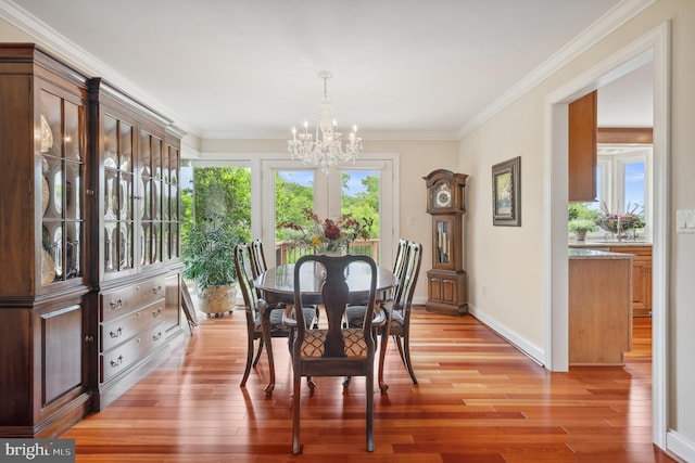 1028 Sandpiper Ln, Annapolis, MD 21403 - dining area with a chandelier, light wood-type flooring, and ornamental molding