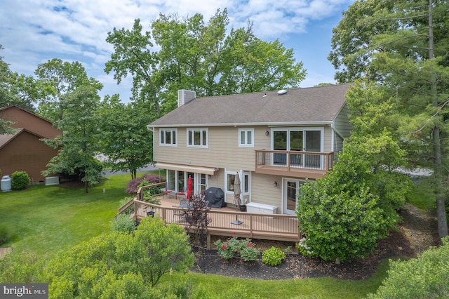 1028 Sandpiper Ln, Annapolis, MD 21403 - back of house with a chimney, a yard, a deck, and a balcony
