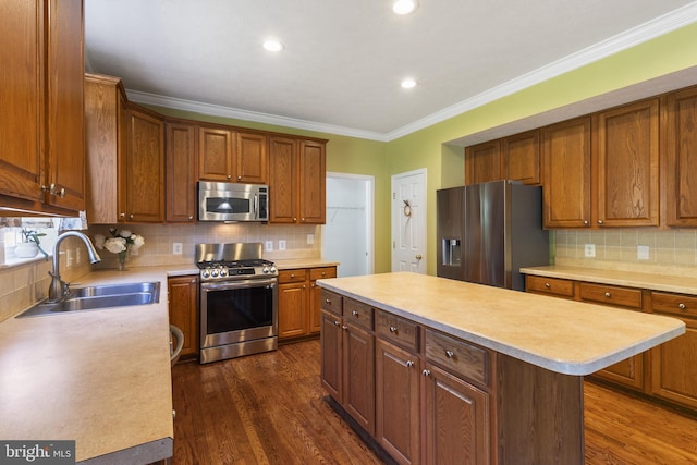 1207 Painted Fern Rd, Denton, MD 21629 - kitchen featuring stainless steel appliances, light countertops, backsplash, ornamental molding, and recessed lighting