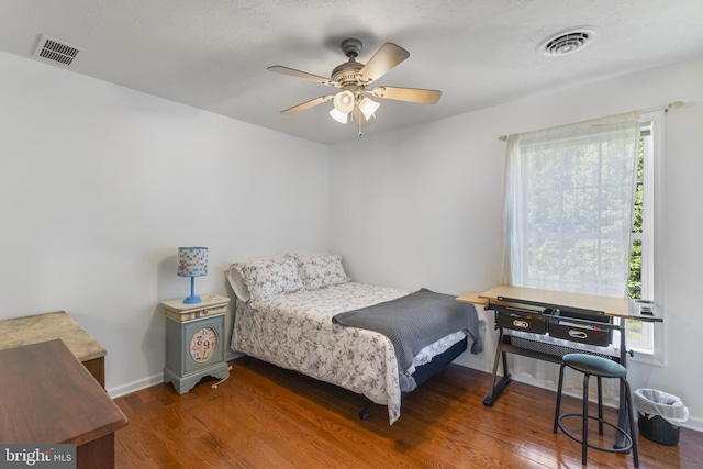 1207 Painted Fern Rd, Denton, MD 21629 - bedroom with wood finished floors, multiple windows, and ceiling fan