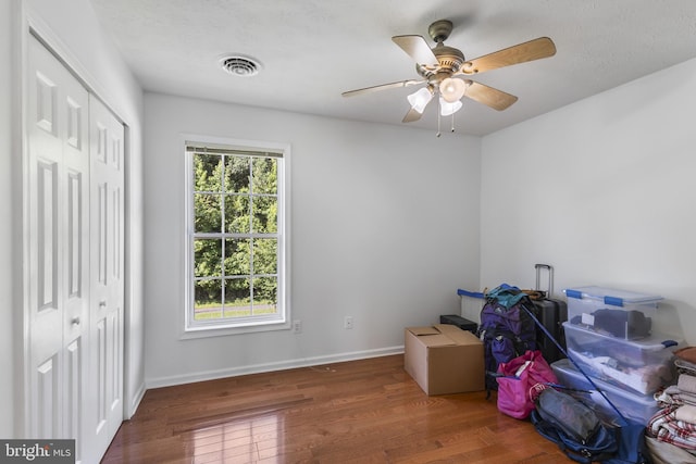 1207 Painted Fern Rd, Denton, MD 21629 - unfurnished bedroom with wood finished floors, a closet, and a ceiling fan