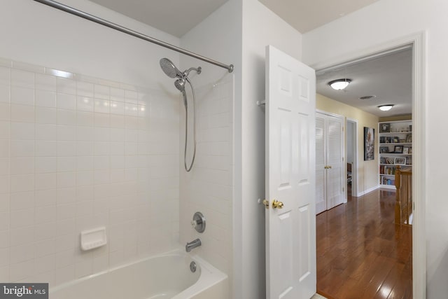 1207 Painted Fern Rd, Denton, MD 21629 - bathroom with shower / washtub combination and wood finished floors