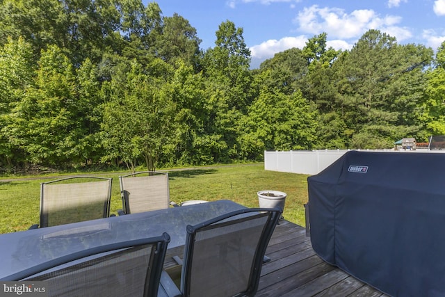 1207 Painted Fern Rd, Denton, MD 21629 - wooden terrace with outdoor dining space, area for grilling, and a lawn