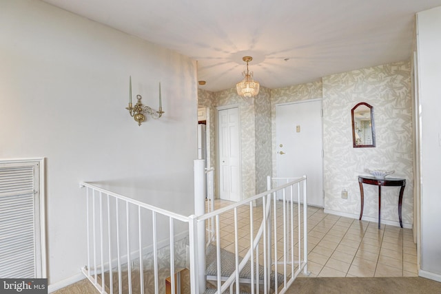 1 Smeton Place 506 & 606, Towson, MD 21204 - hallway with an upstairs landing, baseboards, wallpapered walls, and light tile patterned floors