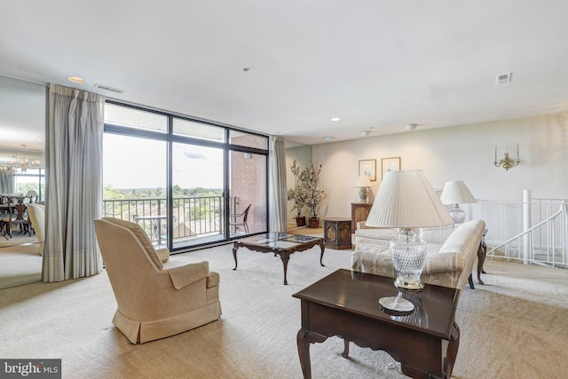 1 Smeton Place 506 & 606, Towson, MD 21204 - living room featuring light carpet, a chandelier, and expansive windows