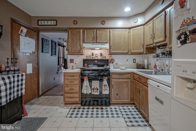 24 Cherry Grove Ln, Sicklerville, NJ 08081 - kitchen featuring white appliances, under cabinet range hood, a sink, and light countertops