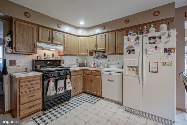 24 Cherry Grove Ln, Sicklerville, NJ 08081 - kitchen featuring white appliances, a sink, under cabinet range hood, light countertops, and backsplash
