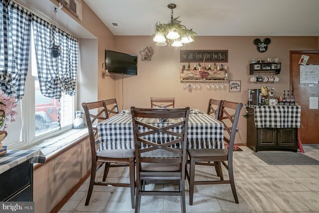 24 Cherry Grove Ln, Sicklerville, NJ 08081 - dining space with a chandelier and light tile patterned floors
