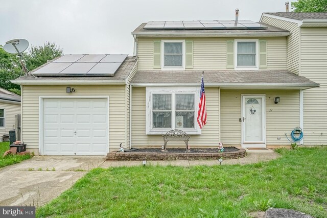24 Cherry Grove Ln, Sicklerville, NJ 08081 - view of front of house with solar panels, driveway, and a garage