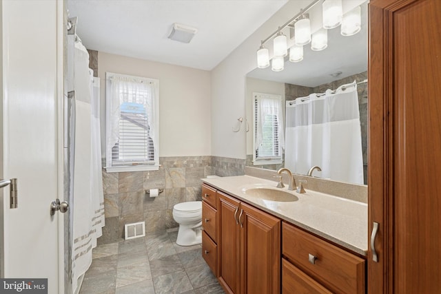 3447 Norwood Pl, Southampton, PA 18966 - full bathroom featuring tile walls, vanity, wainscoting, and a shower with curtain