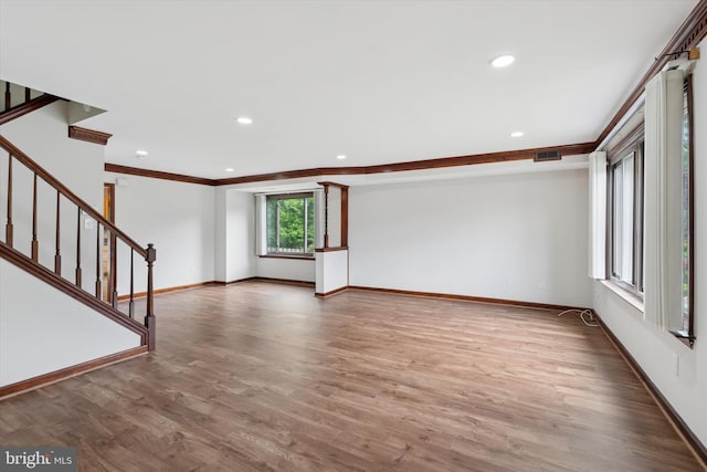 3447 Norwood Pl, Southampton, PA 18966 - empty room with stairway, wood finished floors, recessed lighting, and ornamental molding
