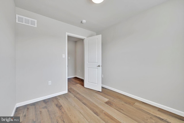 10 Hubbardton Ct, Sinking Spring, PA 19608 - empty room with baseboards, wood finished floors, and a smoke detector