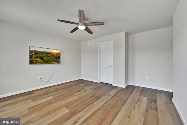 10 Hubbardton Ct, Sinking Spring, PA 19608 - unfurnished bedroom featuring wood finished floors, baseboards, and a ceiling fan