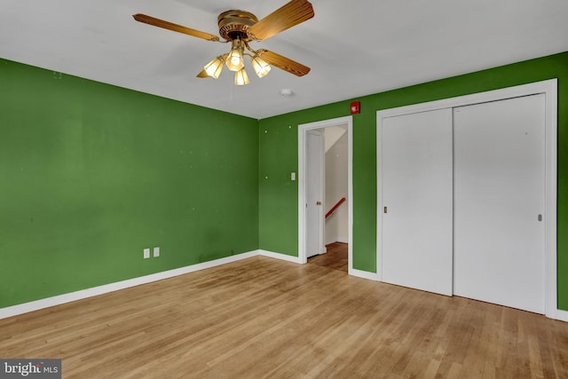 1415 Rockland St, Reading, PA 19604 - unfurnished bedroom featuring wood finished floors, baseboards, a closet, and ceiling fan