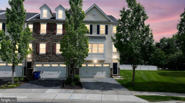 309 Latrobe Dr, Newark, DE 19702 - view of front of property with stone siding, driveway, and a garage