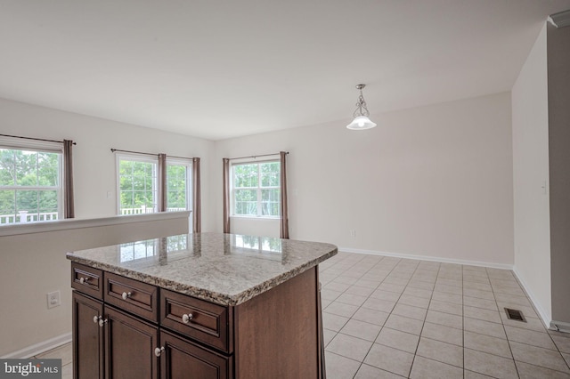 309 Latrobe Dr, Newark, DE 19702 - kitchen with baseboards, pendant lighting, and light tile patterned floors
