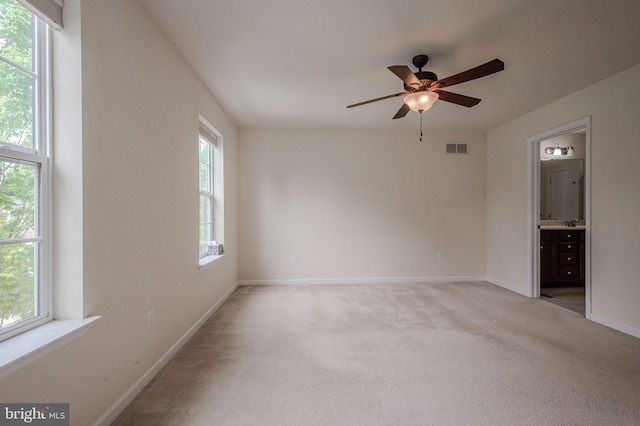 309 Latrobe Dr, Newark, DE 19702 - unfurnished room featuring a ceiling fan, light colored carpet, and baseboards