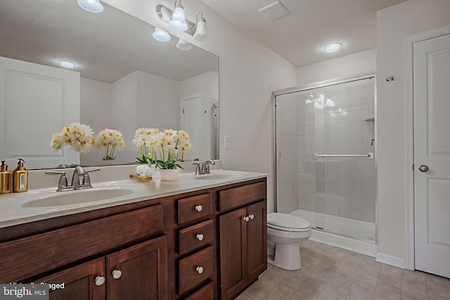 309 Latrobe Dr, Newark, DE 19702 - full bathroom with double vanity, a shower stall, and toilet