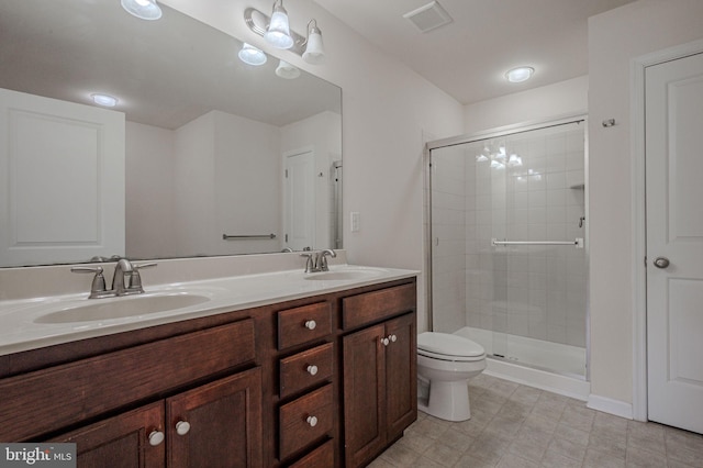 309 Latrobe Dr, Newark, DE 19702 - full bathroom featuring a shower stall, double vanity, and toilet