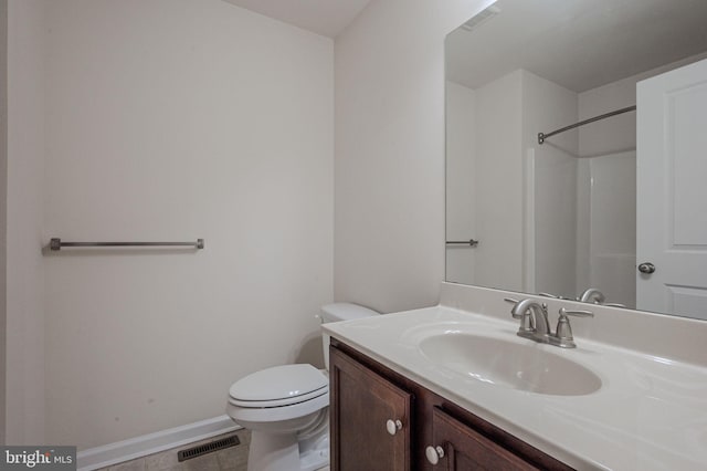 309 Latrobe Dr, Newark, DE 19702 - full bath featuring vanity, toilet, and baseboards