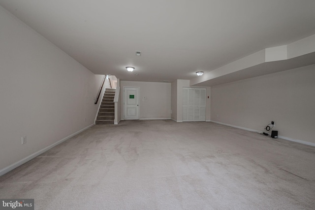 309 Latrobe Dr, Newark, DE 19702 - finished basement featuring stairway, baseboards, and light carpet