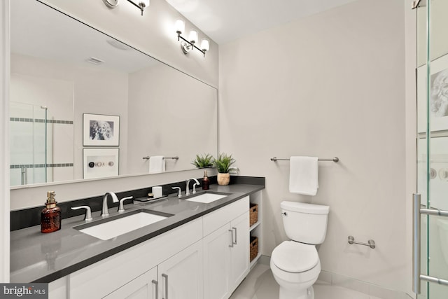 2550 17th St NW Unit 414, Washington, DC 20009 - full bath with toilet, double vanity, and a shower with shower door