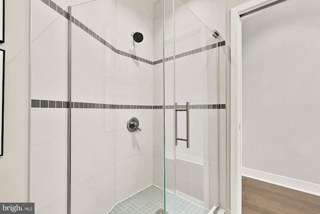 2550 17th St NW Unit 414, Washington, DC 20009 - bathroom with a stall shower and baseboards