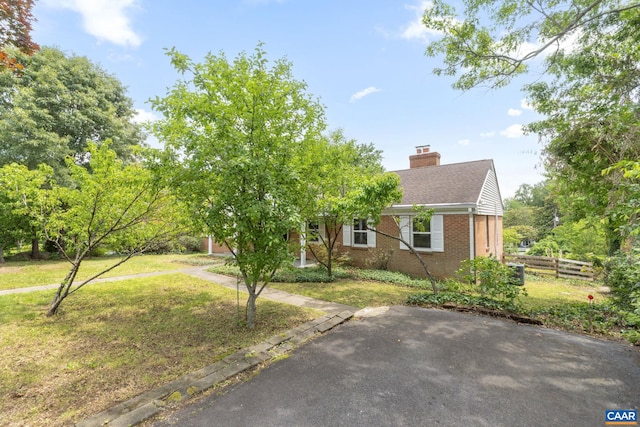 104 Chaucer Rd, Charlottesville, VA 22901 - view of front of house with brick siding and a chimney