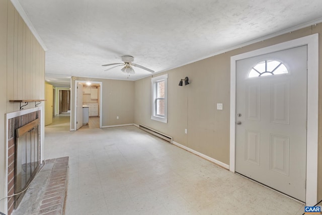 104 Chaucer Rd, Charlottesville, VA 22901 - unfurnished living room with a baseboard heating unit, a brick fireplace, light flooring, a ceiling fan, and crown molding