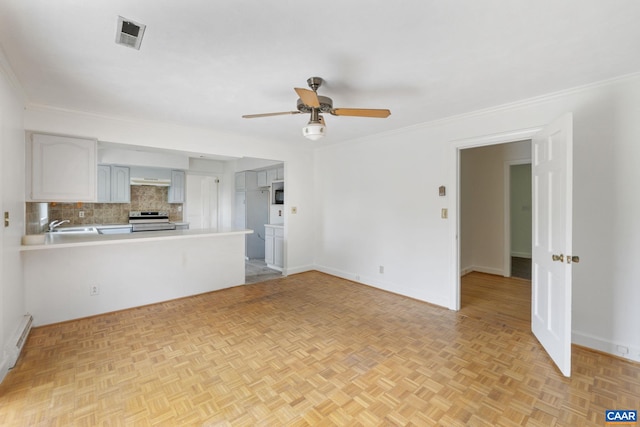 104 Chaucer Rd, Charlottesville, VA 22901 - unfurnished living room featuring ceiling fan, baseboards, and crown molding