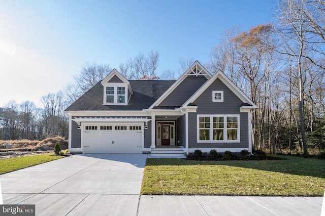 23412 E Gate Dr, Frankford, DE 19945 - view of front of property featuring driveway, an attached garage, and a front yard