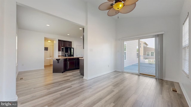637 Coldwater Dr, Clayton, DE 19938 - unfurnished living room with healthy amount of natural light, light wood-style flooring, ceiling fan, baseboards, and recessed lighting