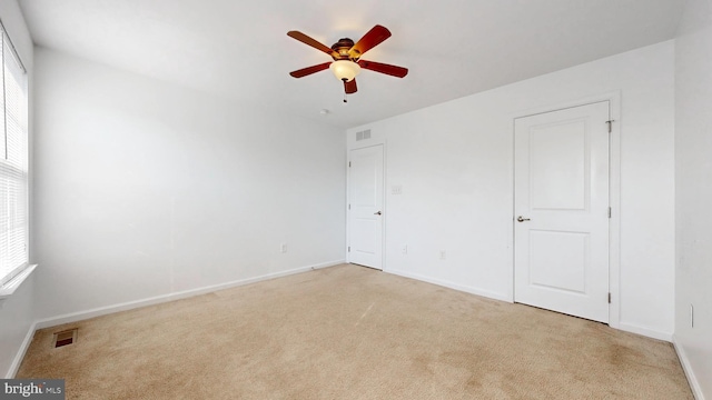 637 Coldwater Dr, Clayton, DE 19938 - unfurnished bedroom featuring multiple windows and carpet