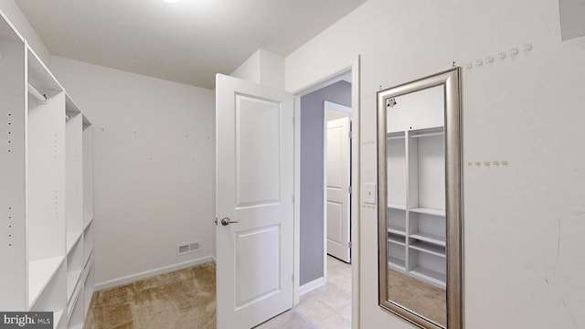 637 Coldwater Dr, Clayton, DE 19938 - walk in closet featuring light carpet