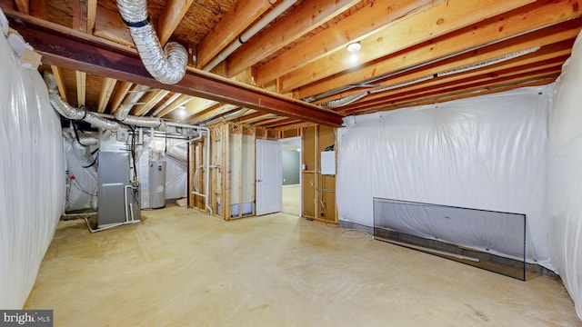637 Coldwater Dr, Clayton, DE 19938 - unfinished below grade area featuring electric water heater and heating unit