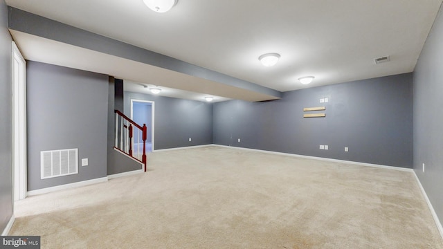 637 Coldwater Dr, Clayton, DE 19938 - finished below grade area with carpet, baseboards, and stairway